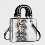 Izabela - Koeramustriga Käekott